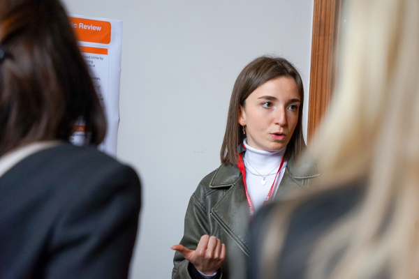 Student Luna Tafuri explaining her research project