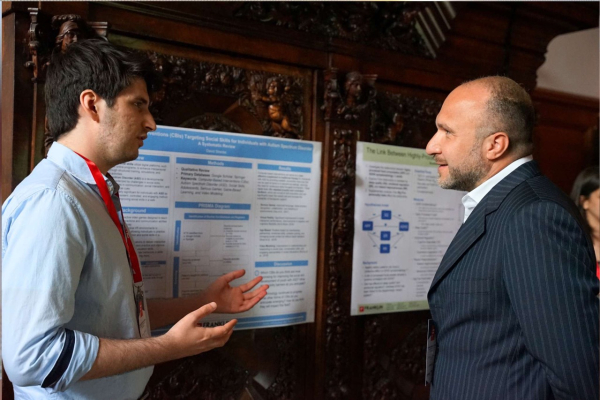 Student David Streidel explaining his research project