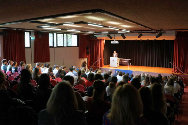 Nielsen Auditorium filled with students and their families attending the ceremony